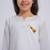 girls wear white cambric kurta with holi chest print