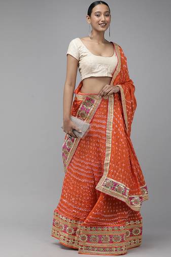 orange silk lehenga with patchwork dupatta and blouse