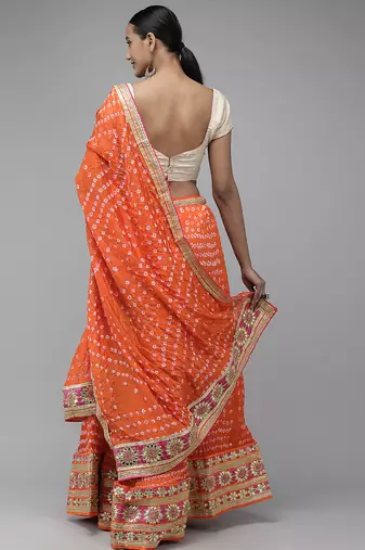 orange silk lehenga with patchwork dupatta and blouse