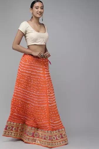 orange silk lehenga with patchwork dupatta and blouse