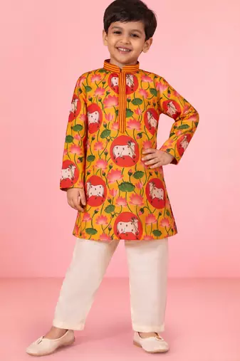 boys yellow pichwai print muslin kurta with cream pyjama     wedding & festive wear