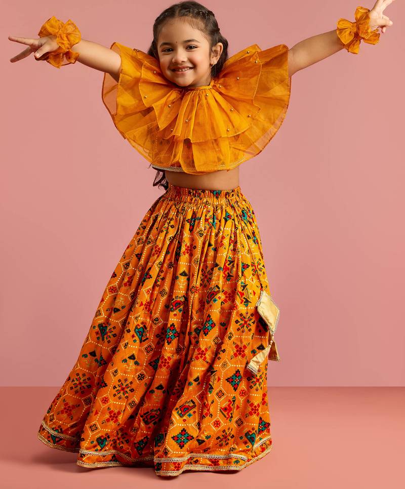 girls mustard printed rayon patola lehenga choli set with ruffles & ruffled hand gloves