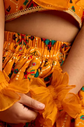girls mustard rayon lehenga choli with ruffles