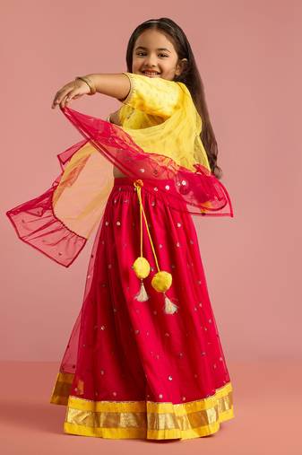 girls red net lehenga choli with foil print
