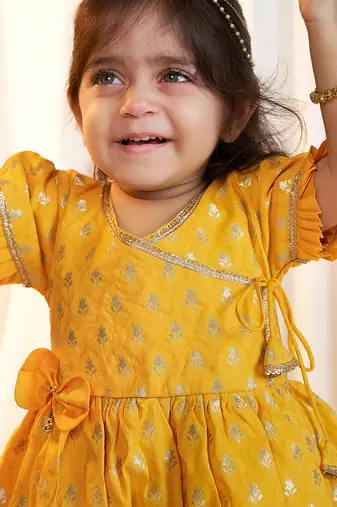 girls wear mustard jacquard angrakha frock set