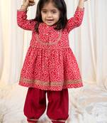 girls wear red bandhani cotton kurta with patiala cotton set