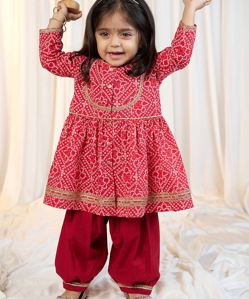 girls wear red bandhani cotton kurta with patiala cotton set