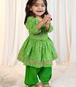 girls wear green cotton bandhani kurta patiala set