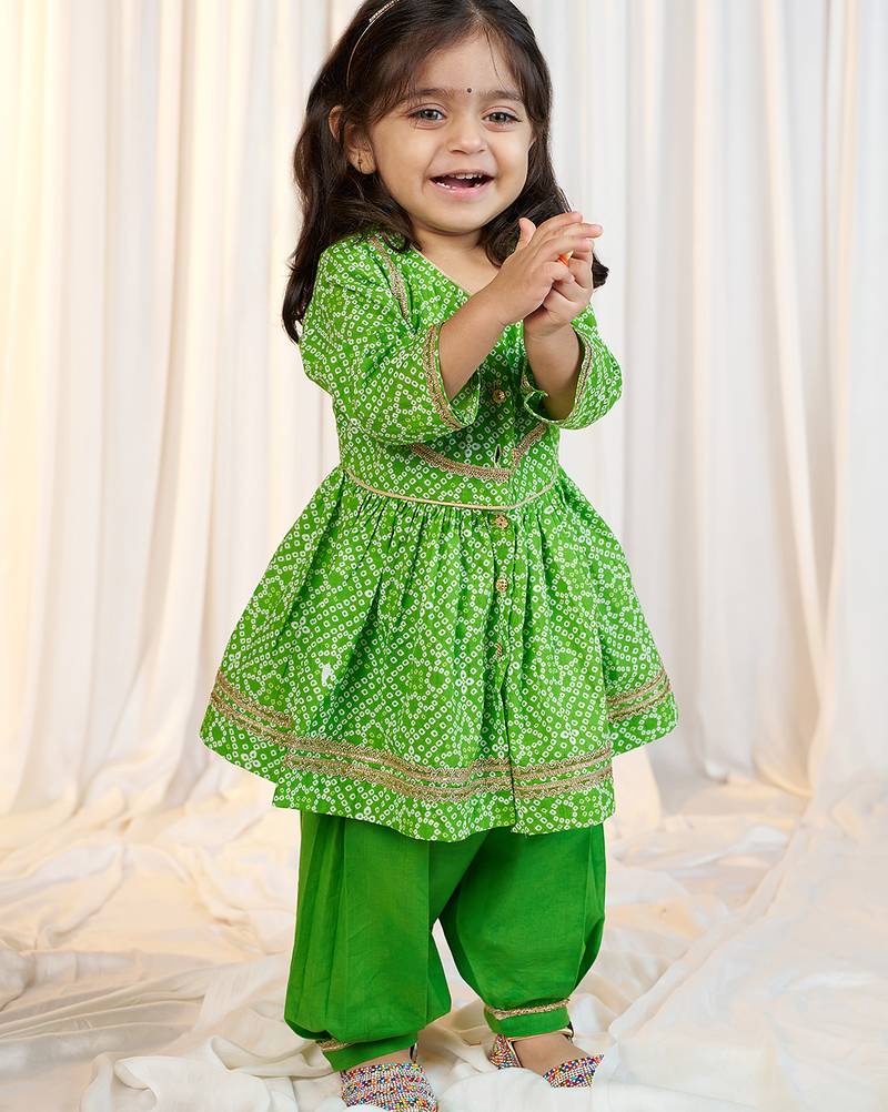 girls wear green cotton bandhani kurta patiala set