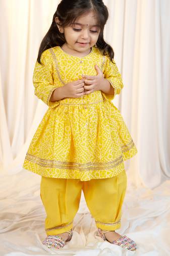 girls wear yellow bandhani cotton kurta with patiala set cotton