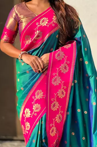 teal soft silk zari woven saree with contrast blouse