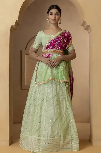 green and fuchsia silk lehenga with blouse and dupatta set
