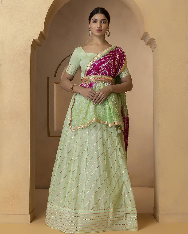 green and fuchsia silk lehenga with blouse and dupatta set