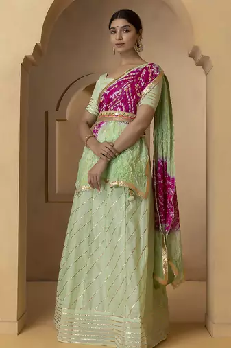 green and fuchsia silk lehenga with blouse and dupatta set