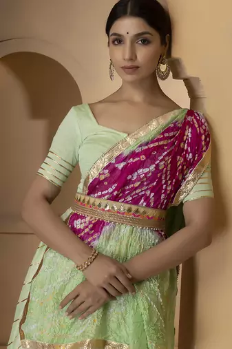 green and fuchsia silk lehenga with blouse and dupatta set