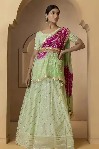 green and fuchsia silk lehenga with blouse and dupatta set