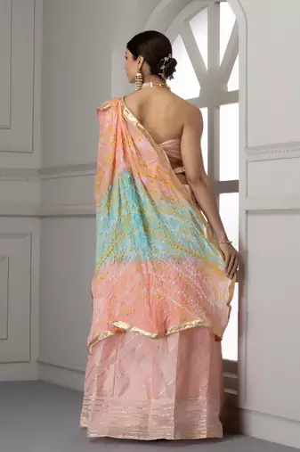 peach and blue silk lehenga with unstitched blouse dupatta