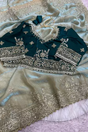 light green satin saree with embroidery and heavy border