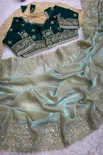 light green satin saree with embroidery and heavy border