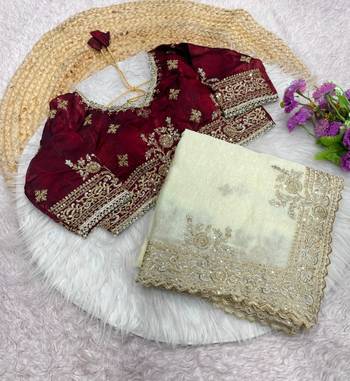 white satin saree with embroidery and heavy border 4