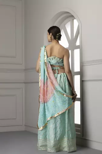 turquoise blue pink embellished silk lehenga set