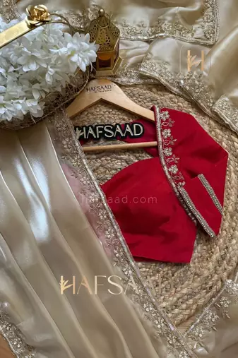 cream organza satin saree with embroidered border