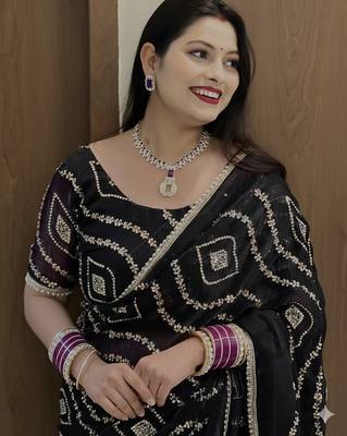 black satin saree with embroidered fancy lace border 1