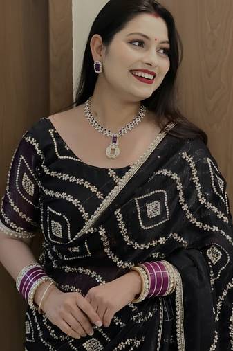 black satin saree with embroidered fancy lace border