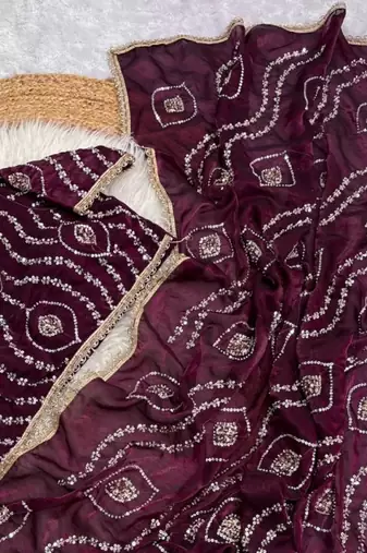 plum satin art silk saree with hand work lace border