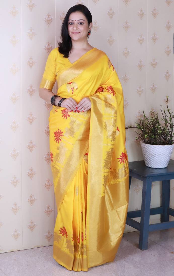 Yellow soft silk zari weaving saree with matching blouse piece