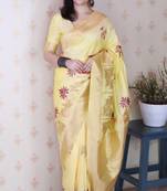 light yellow silk blend saree with zari floral weaving