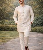 Off white color embroidery sequence work slub silk kurta koti pant set