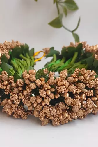 gold paper hair gajra with pollen work