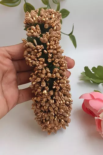 gold paper hair gajra with pollen work