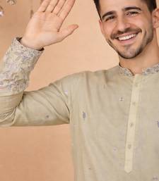 Beige color embroidery sequence work linen cotton kurta payjama set