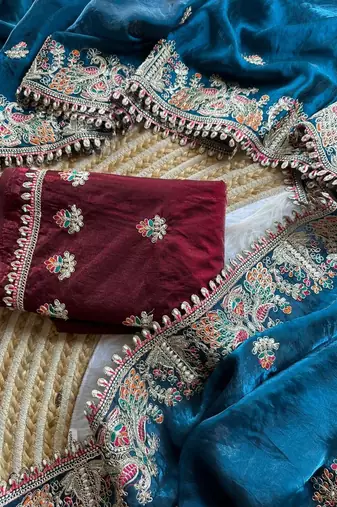 blue satin silk saree with heavy embroidered floral border