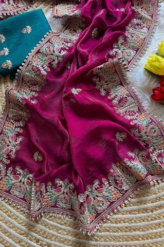 rani pink satin silk saree with floral embroidery and tassels