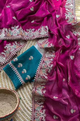rani pink satin silk saree with floral embroidery and tassels