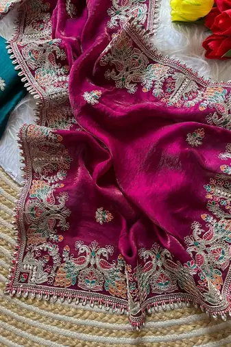 rani pink satin silk saree with floral embroidery and tassels
