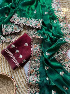 green satin silk saree with floral embroidery and tassels 2