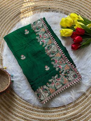 green satin silk saree with floral embroidery and tassels 4