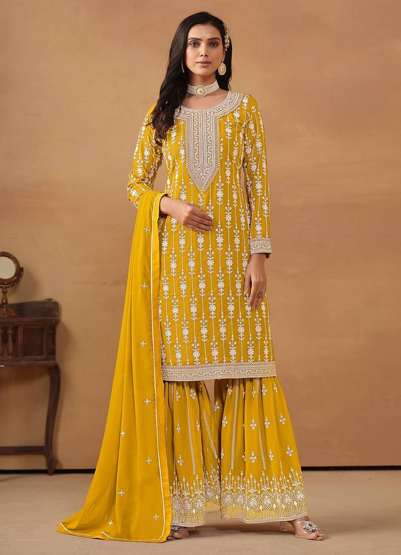 Yellow georgette embroidery & sequins semi stitched suit size up to 42