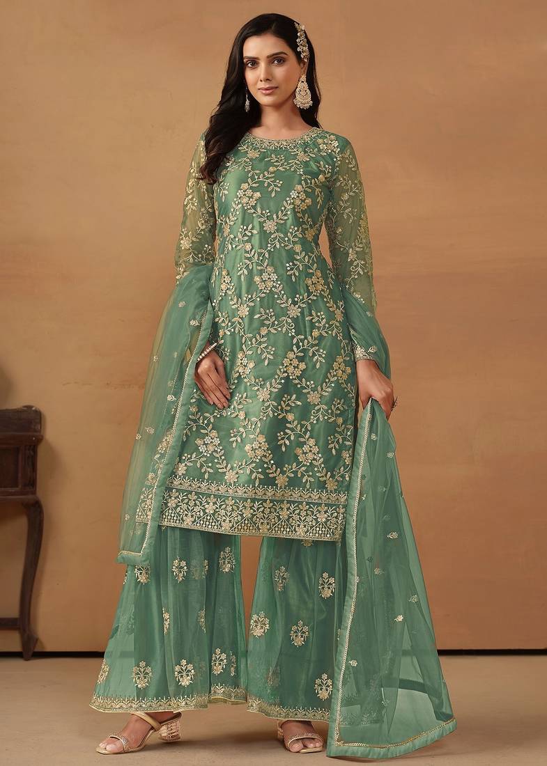 Turquoise net embroidery & sequins semi stitched suit size up to 42
