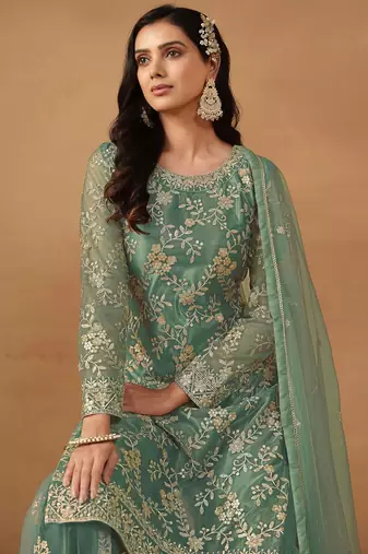 Turquoise net embroidery & sequins semi stitched suit size up to 42