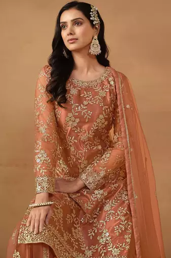 Peach net embroidery & sequins semi stitched suit size up to 42