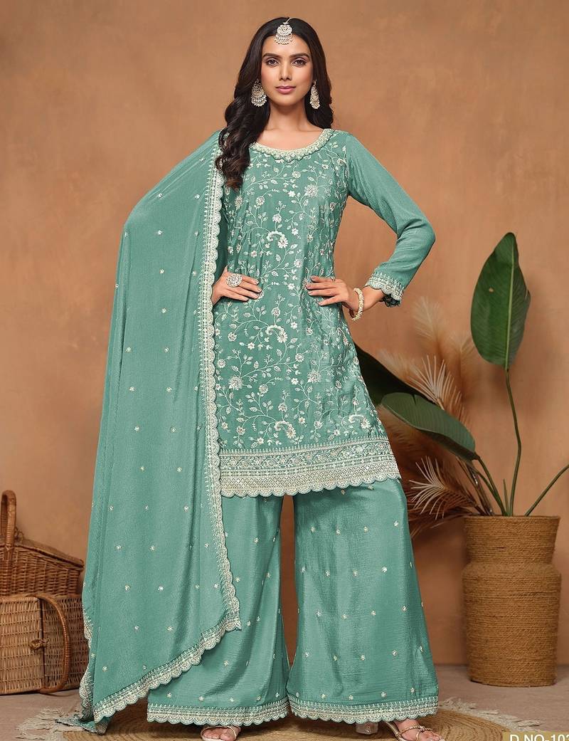 Turquoise chinnon embroidery & sequins semi stitched suit size up to 42