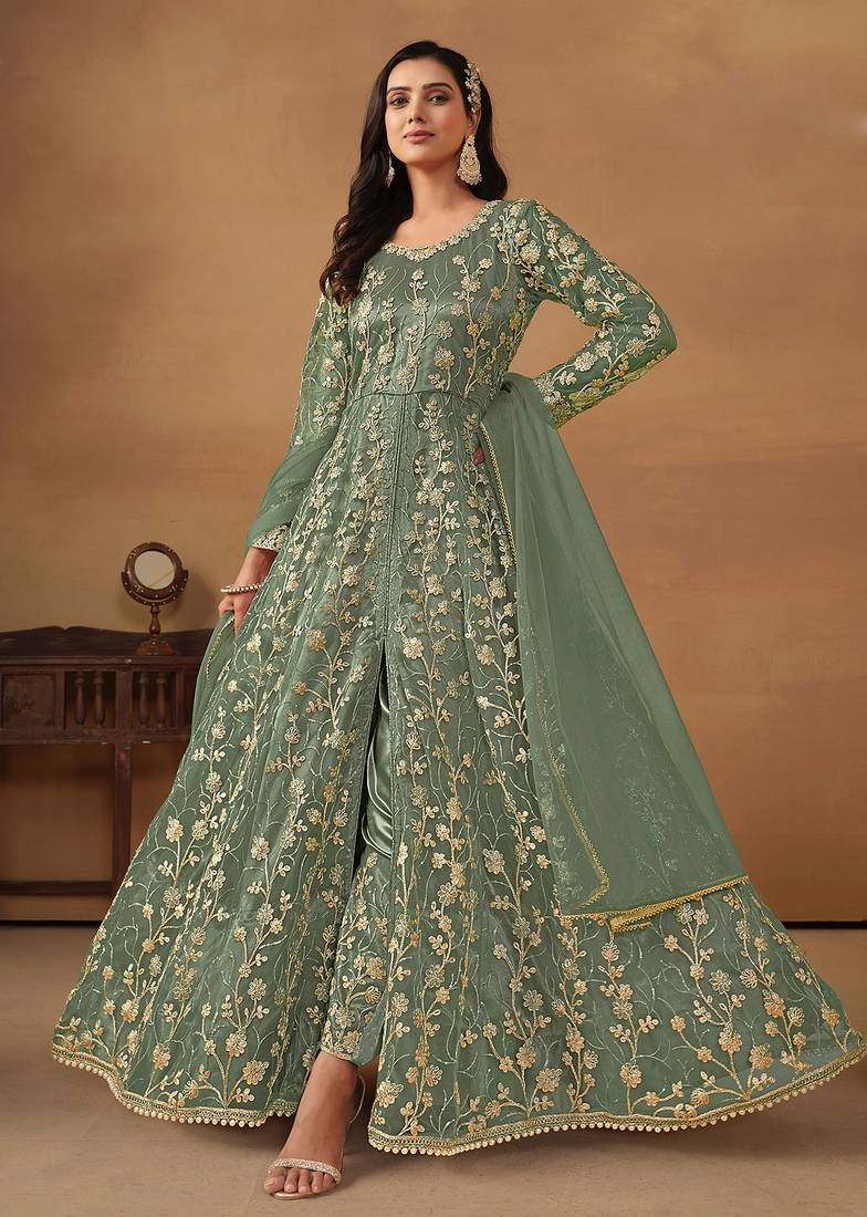 Pista green net embroidered & sequins semi stitched suit size up to 42