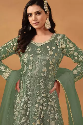 Pista green net embroidered & sequins semi stitched suit size up to 42