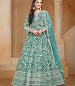Turquoise net embroidery & sequins semi stitched suit size up to 42