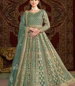 Teal green net embroidery & sequins semi stitched suit size up to 42